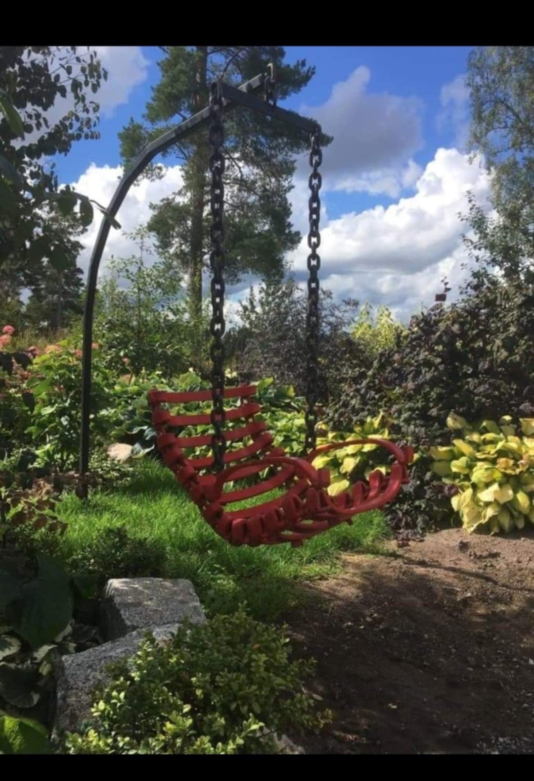 Hängande stol i metall